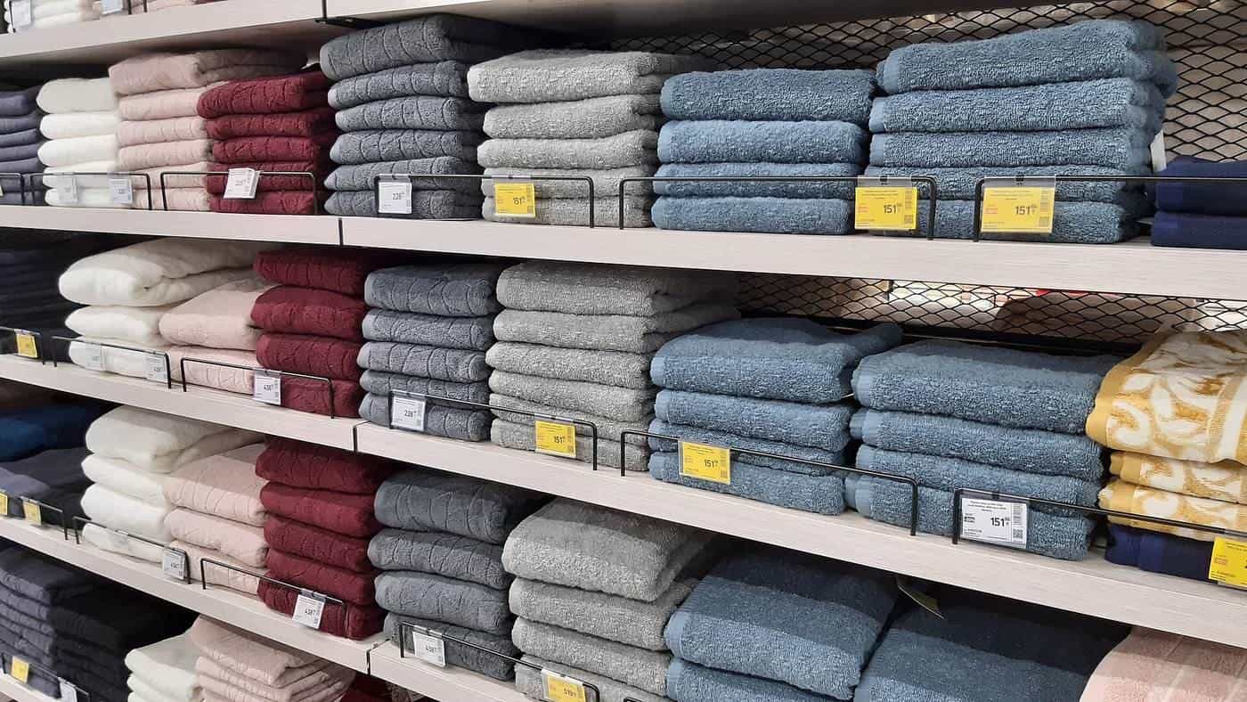 Folded towels on shelves